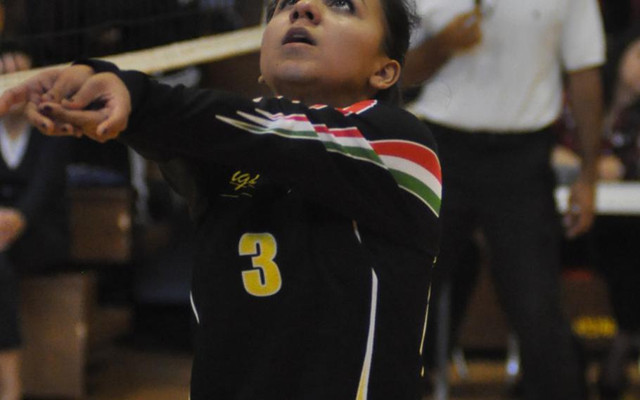 Vicenza's Gabriela Campos digs the ball during the Cougars' match with Stuttgart on Friday. Oct. 7, 2016.