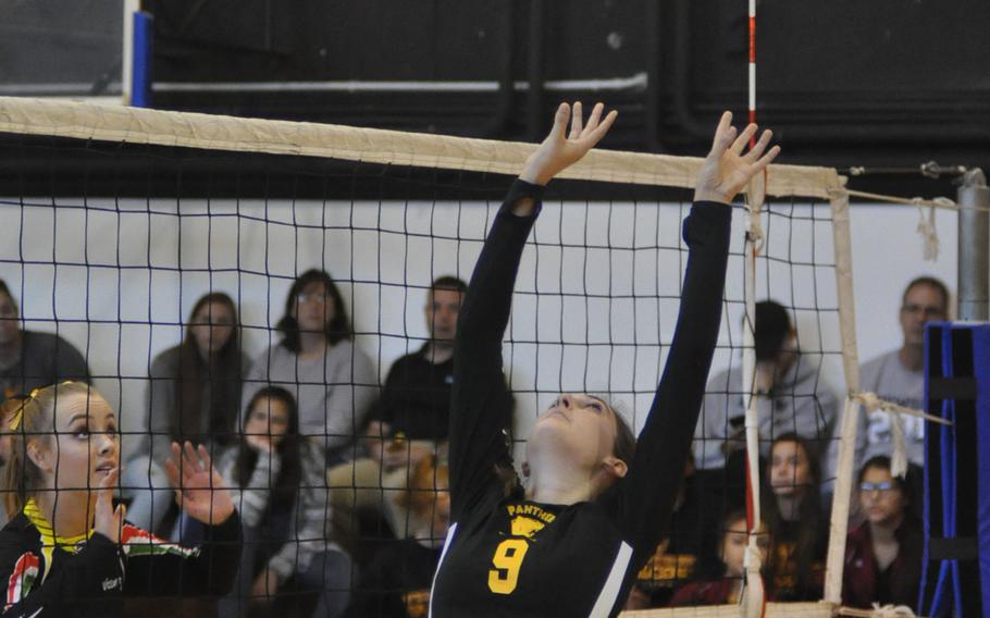 Stuttgart's Alexa Smith sets the ball behind her to a teammate during the Panthers' match with Vicenza on Friday, Oct. 7, 2016.
