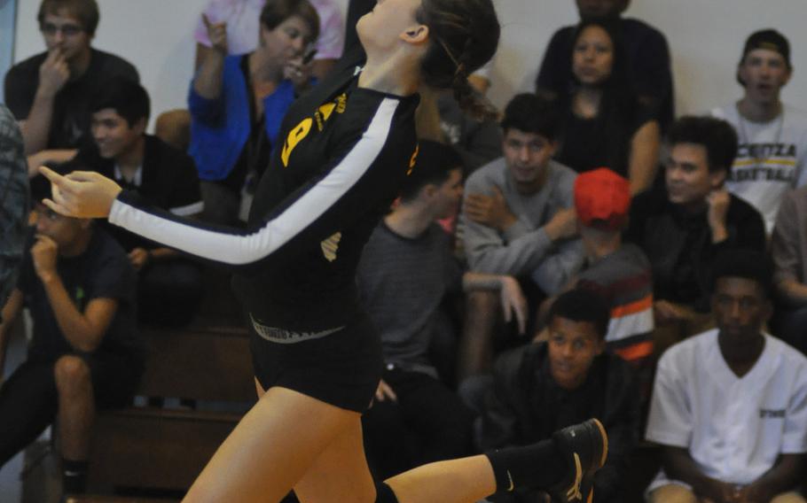 Stuttgart's Alexa Smith launches a serve against Vicenza on Friday, Oct. 7, 2016. The Panthers stayed unbeaten on the season with a sweep of the Cougars and serving played a major role.