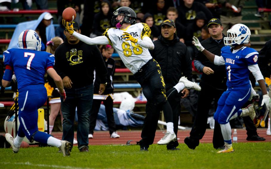 Stuttgart's Sean Loeben jumps for a pass at Ramstein Air Base, Germany, on Saturday, Oct. 15, 2016. Stuttgart lost the game to Ramstein 29-0.