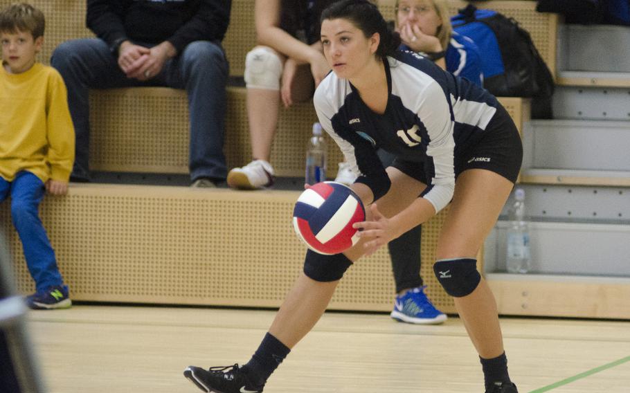 Erin Fortune of Black Forest Academy prepares to serve against Baumholder Saturday, Oct. 16 at Spangdahlem, Germany. Fortune, BFA's captain, uses a jump serve which generates a lot of power.