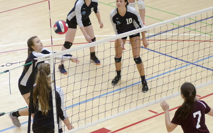 Leah Kennedy of Black Forest Academy looks to set the ball for teammate Erin Fortune during a match against Baumholder, Saturday, Oct. 15, 2016 in Spangdahlem, Germany. BFA took the match in four sets, 25-18, 25-21, 27-29 and 25-14.