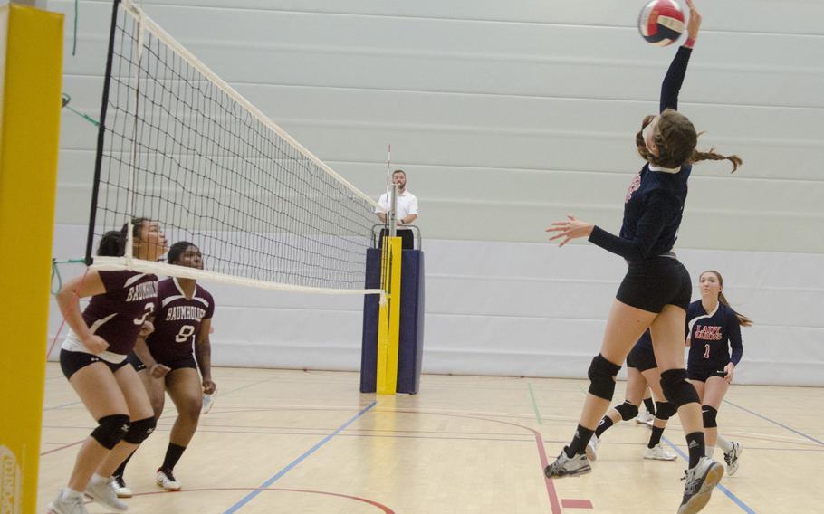 Hannah Bissonnette of Bitburg spikes the ball against Baumholder during the third and final set of their match Saturday, Oct. 15, 2016 at Spangdahlem Air Base, Germany. Bitburg defeated Baumholder in straight sets before falling to Brussels in a hard-fought match that went to five sets.