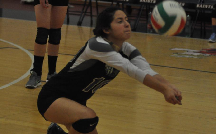 Hohenfels' Alexus Garcia digs the ball during the Tigers' 25-12, 25-16, 25-12 loss to Sigonella on Friday night.