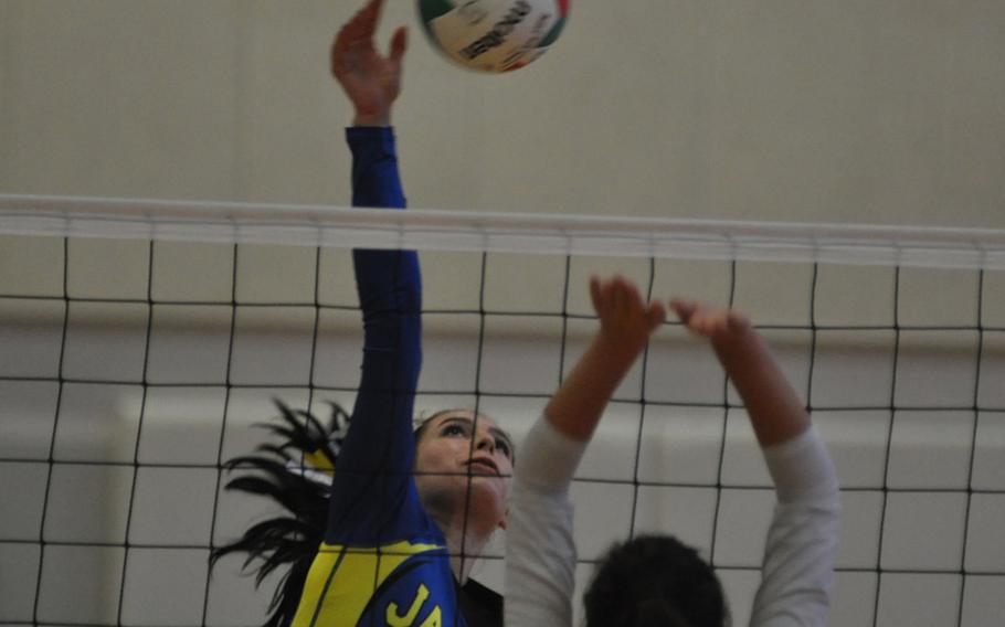 Sigonella's Liz Camus spikes the ball before Hohenfels can establish a block in the Jaguars' 25-12, 25-16, 25-12 victory on Friday night at Aviano Air Base in Italy.