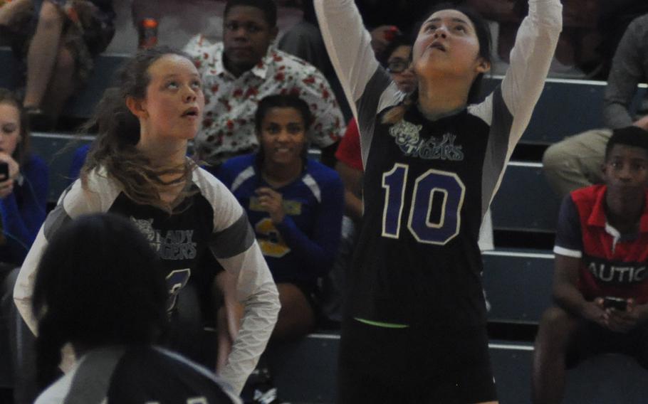 Hohenfels' Alexus Garcia sets the ball Saturday during a match against Aviano at Aviano Air Base, Italy.