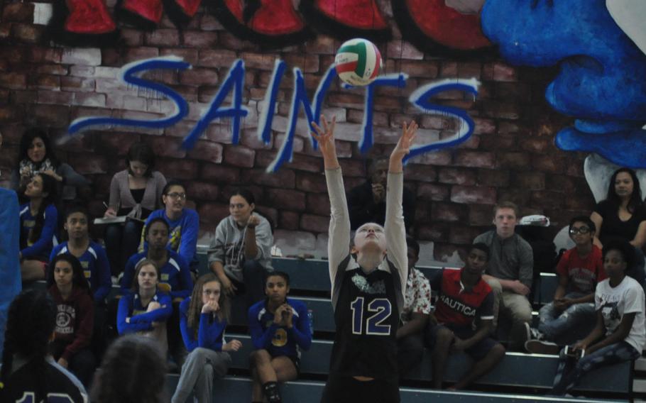 Hohenfels' Angel England sets the ball Saturday in a match against Aviano at Aviano Air Base, Italy.