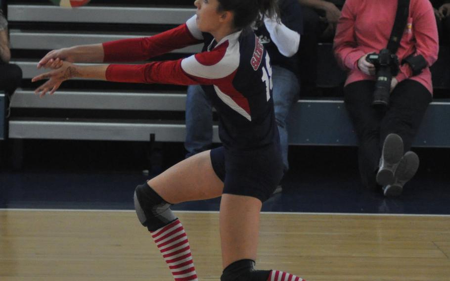 Aviano's Julia Markel digs the ball Saturday in a match against Hohenfels at Aviano Air Base, Italy.