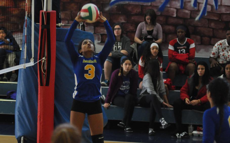 Ansbach's Shermaine Nesbitt sets the ball in her team's match against Sigonella at Aviano Air Base, Italy, on Saturday.