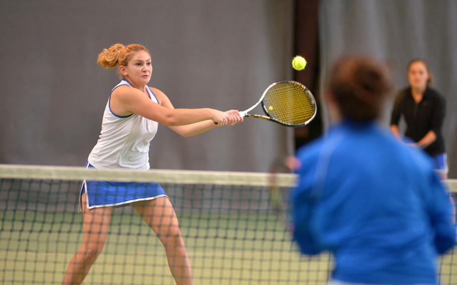 Ramstein's Amanda Daly knocks a ball back over the net in a girls doubles match at the DODEA-Europe tennis championships in Wiesbaden, Germany, Thursday, Oct. 27, 2016.  Daly and teammate Sophie Tomatz beat Marymount's Isabella Suplicy and Elena Bittori 7-5, 7-5.