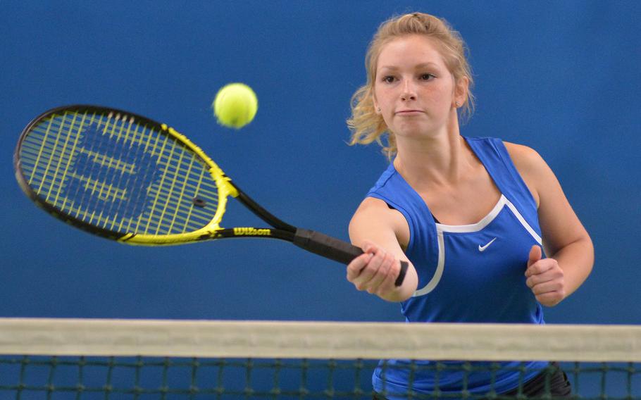 Hohenfels' Olivia Welch returns a ball at the net in girls doubles action on opening day of the DODEA-Europe tennis championships in Wiesbaden, Germany, Thursday, Oct. 27, 2016. Welch and partner Chloe Witty defeated Stuttgart's Hannah Cahill and Natasha Kruelski in a close match 6-4, 4-6, 11-9.