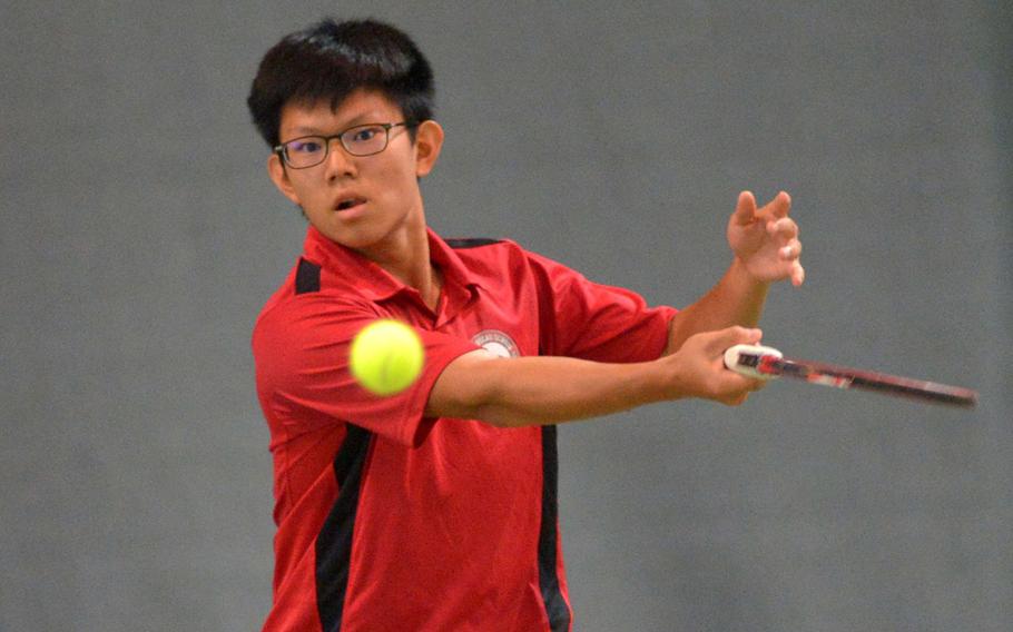 AOSR's Ting Lin returns a shot by Florence's Francesco Londono in a boys singles semifinal match at the DODEA-Europe tennis championships in Wiesbaden, Germany, Friday, Oct. 28, 2016. Londono won 6-3, 6-2.
