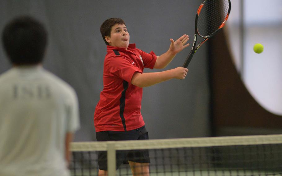 American Overseas School of Rome's Federico Sarti returns a shot against International School of Brussels Team #1in a boys doubles semifinal at the DODEA-Europe tennis championships in Wiesbaden, Germany, Friday, Oct. 28, 2016. Sarti and teammate William Hsia lost the match 6-1, 6-1.