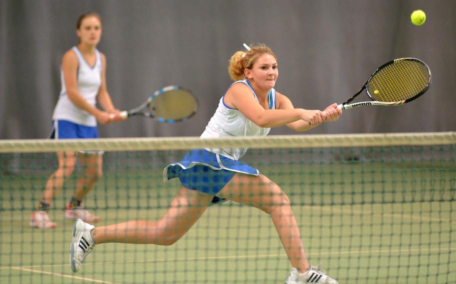 Ramstein's Amanda Daly returns a shot against ISB in the doubles final at the DODEA-Europe tennis championships in Wiesbaden, Germany, Saturday Oct. 29, 2016. Daly and teammate Sophie Tomatz, rear, beat Brune Luciat-Labry and Hortense L'Hostis 2-6, 6-3, 6-2.