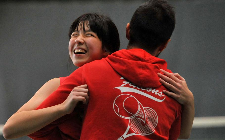 American School of Rome's Kaya Rand celebrates with coach Valerie Aureli after capturing the girls single title at the DODEA-Europe tennis championships in Wiesbaden, Germany, Saturday Oct. 29, 2016, defeating Vicenza's Kiki Sibilla 3-6, 6-4, 6-1.