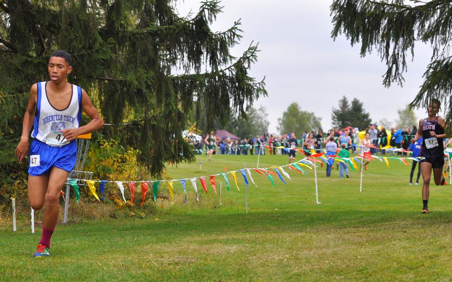 Hohenfels' Jeremias Serrano-Velez maintained a small lead on Lakenheath's Austin Burt about midway through the 2016 DODEA European cross country championships in Baumholder, Germany, on Saturday. Burt finished fourth in the race, less than five seconds behind Serrano-Velez, who was third.