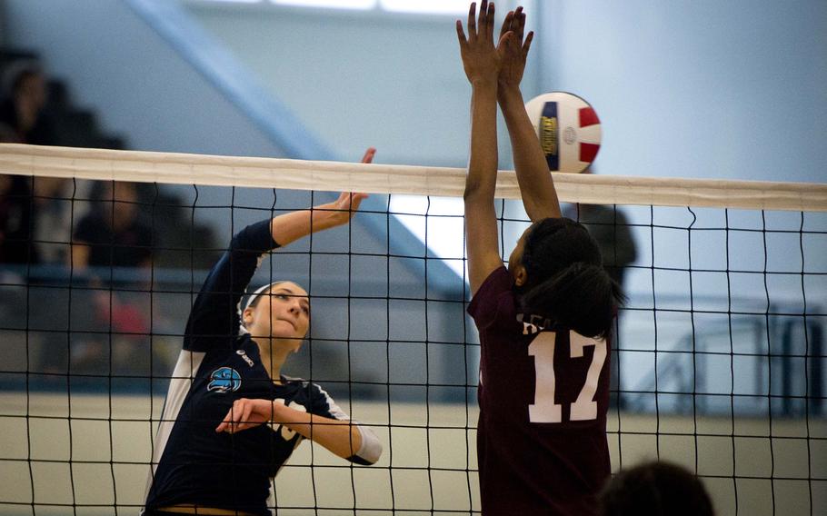AFNORTH's Milahni Wilkerson, right, blocks a spike by Black Forest Academy's Erin Fortune at Vogelweh, Germany, on Thursday, Nov. 3, 2016. AFNORTH lost 25-19, 26-24 and 25-13.