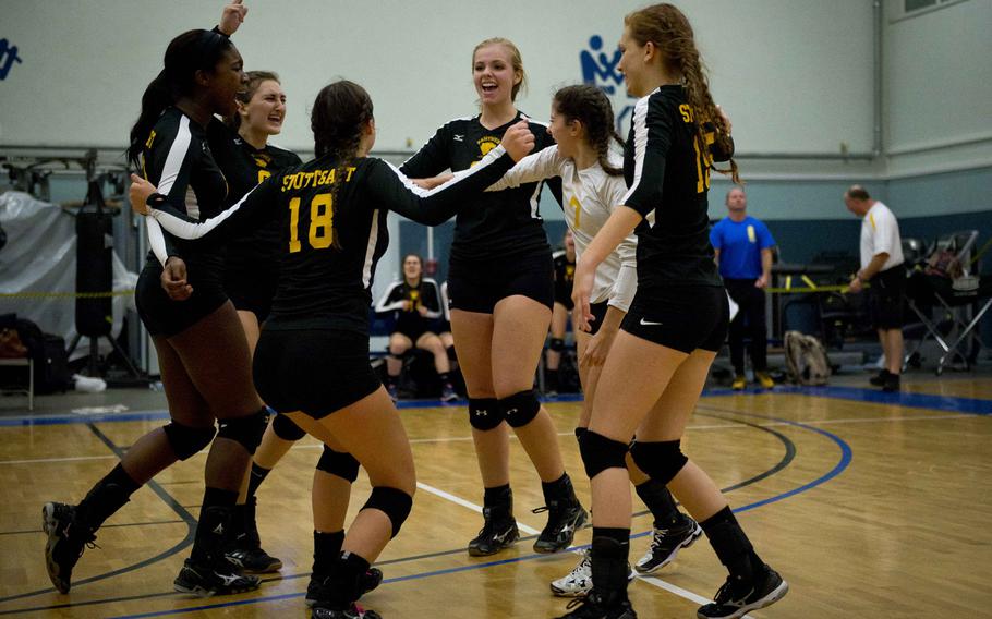 Stuttgart celebrates winning a  DODEA-Europe Division I semifinal match against Naples at Vogelweh, Germany, on Friday, Nov. 4, 2016. Stuttgart won 25-15, 19-25, 25-16 and 25-16.