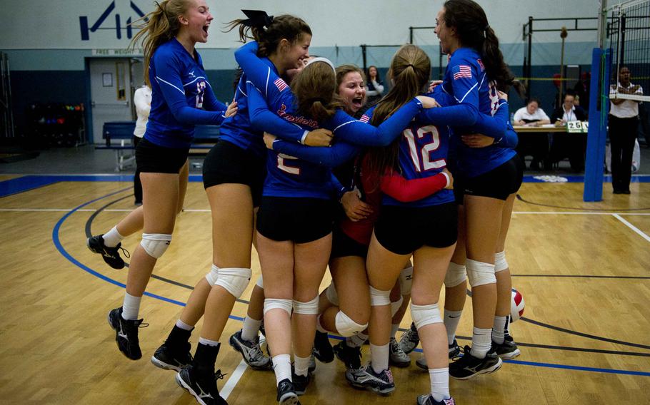 Ramstein celebrates winning its DODEA-Europe Division I semifinal match against Lakenheath at Vogelweh, Germany, on Friday, Nov. 4, 2016. Ramstein won 25-20, 21-25, 25-15 and 25-16.