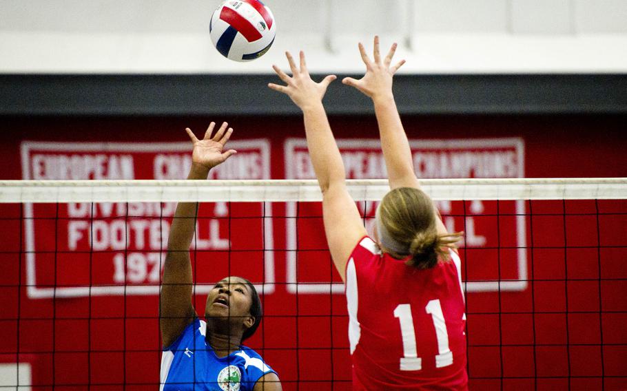 Stuttgart's Meadau Cunningham, left, and Vicenza's Adrianna Lovelace battle for the ball during a DODEA-Europe Volleyball All-Star match in Kaiserslautern, Germany, on Saturday, Nov. 12, 2016.

Michael B. Keller/Stars and Stripes
