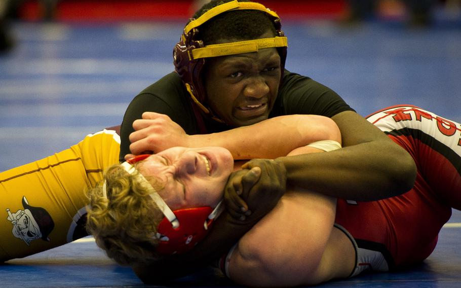 Baumholder's Yorel Smalls tries to pin Kaiserslautern's Roderick Hendricks during a match at Ramstein Air Base, Germany, on Saturday, Jan. 14, 2017.