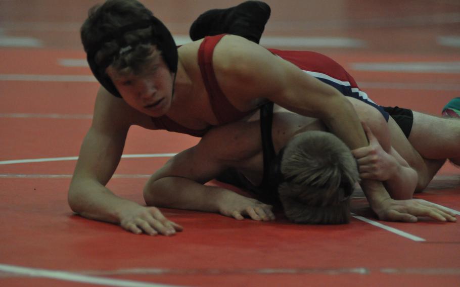 Aviano's Liam Knowles won at 126 pounds, including this victory over Naples' Chase Reasland.