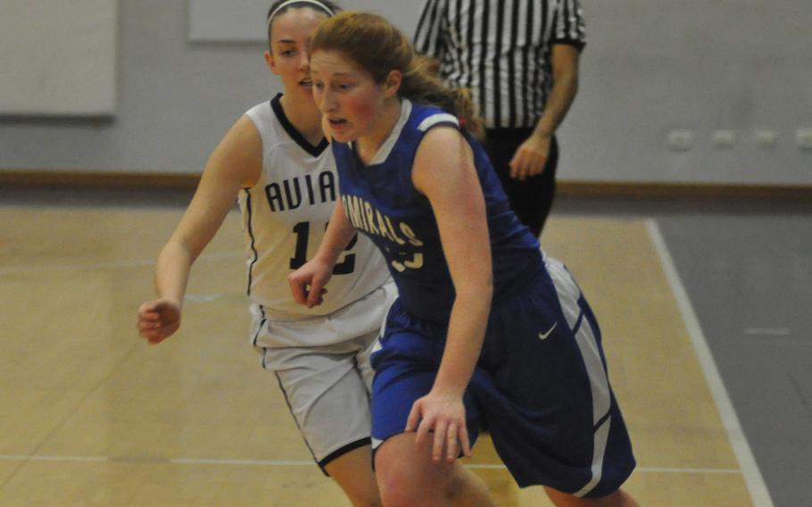 Rota's Emma Hook drives toward the basket in the Admirals' 47-31 victory Thursday over the Aviano Saints in Italy.
