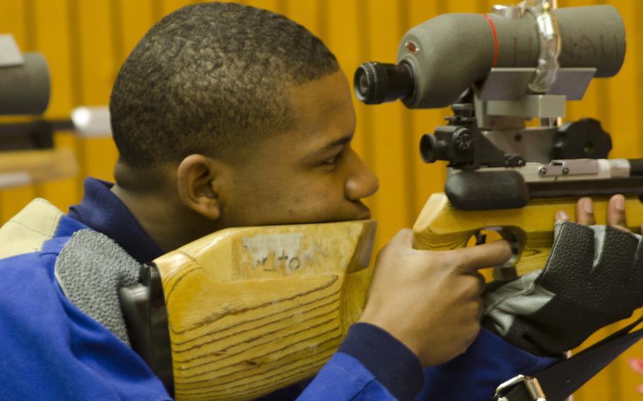 Davion Russell of Bitburg prepares to fire during a conference marksmanship competition in Wiesbaden, Saturday, Jan. 21, 2017. Russell finished first on his team with a 263.