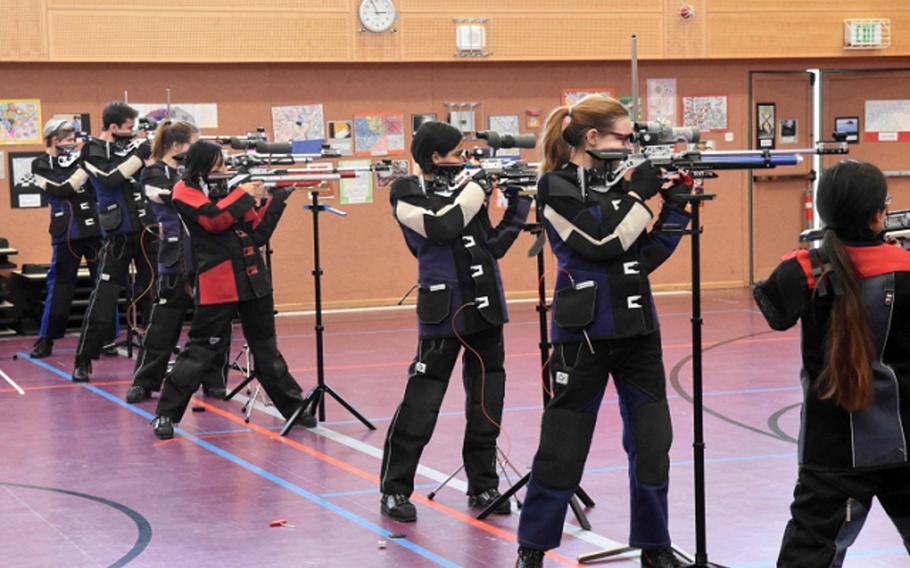 A line of shooters takes fire during the European Marksmanship championships on Saturday, where Stuttgart triumphed for the fourth straight year.