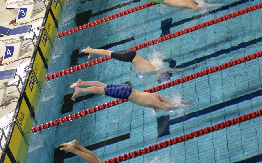Boys from the 12-year-old age group 50-meter butterfly dive into the pool at the European Forces Swim League championships in Eindhoven, Netherlands, Saturday, Feb. 25, 2017. 