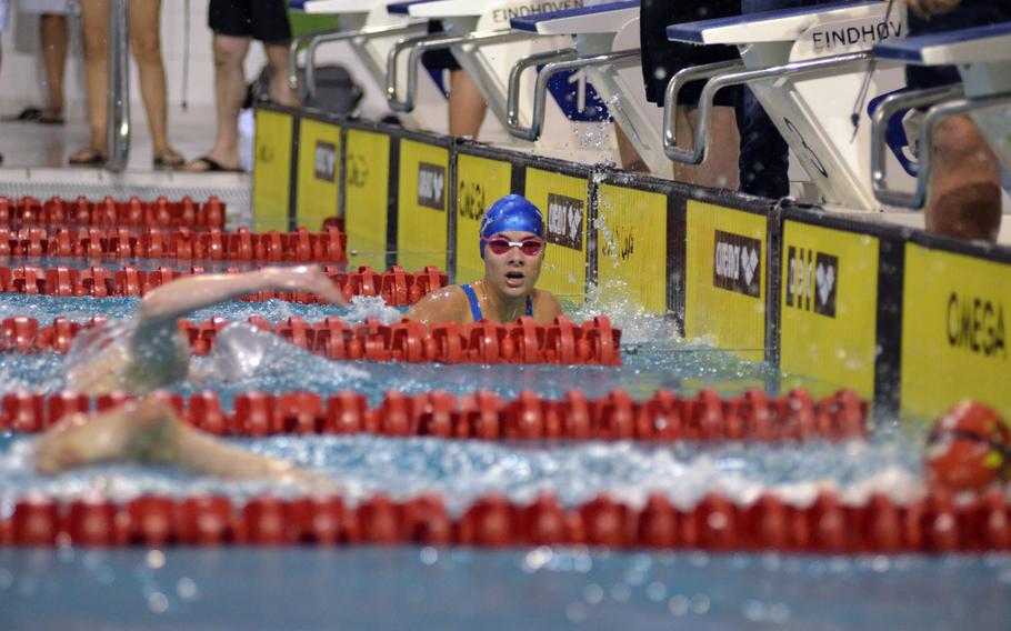 Lisbon swimmer Maria Lopes de Freitas checks out her competition after finishing the girls 17-19 age group 100-meter individual freestyle at the European Forces Swim League championships in Eindhoven, Netherlands, Saturday, Feb. 25, 2017.