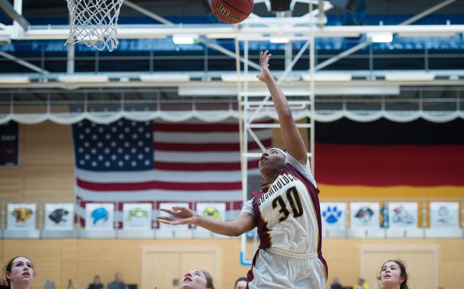 Baumholder's Tytianna Martinez goes for a layup during the DODEA-Europe Division III championship in Wiesbaden, Germany, on Saturday, Feb. 25, 2017.