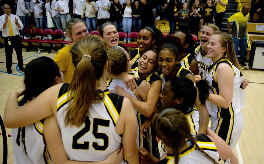 Stuttgart celebrates winning the DODEA-Europe Division I championship in Wiesbaden, Germany, on Saturday, Feb. 25, 2017. Stuttgart defeated Ramstein 36-8 to win the title.