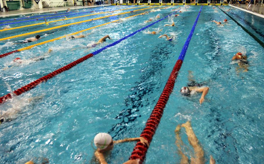 Swimmers from 18 different teams across 11 countries warm-up during the second day of the annual European Forces Swim League championships in Eindhoven, Netherlands, Sunday, Feb. 26, 2017. More than 2,000 individual entries into the pool left 20 event records broken.
William Howard/Stars and Stripes