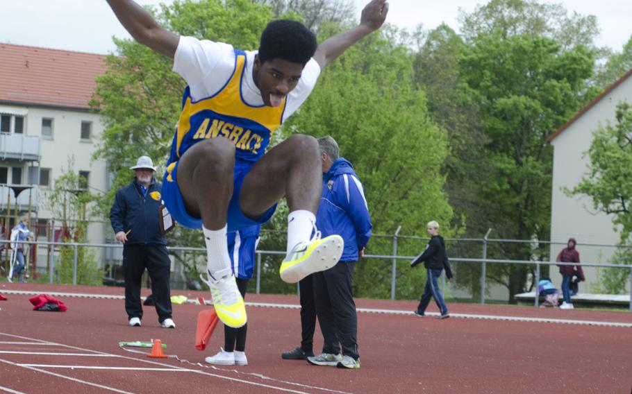 Ogden Andrew of Ansbach prepares to land during a long jump at a seven-team meet Saturday, April 15 in Wiesbaden, Germany. Andrew edged out Kaiserslautern's Gabriel Guaman and took first place with a jump of 18 feet, 10 inches.