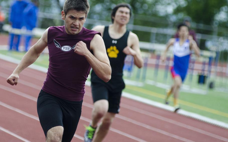 Michael George of Vilseck charges to the finish line of the 400-meter dash at a seven-team meet Saturday, April 15 in Wiesbaden, Germany. George, a freshman, finished first in his heat and eighth overall in the event with a time of 56.77.