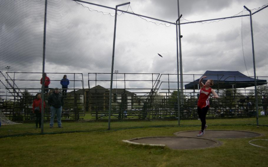 Lakenheath's Camryn Burt throws a discus in her track and field appearance during the opening meet of the season at RAF Lakenheath, England, Saturday, April 15, 2017.