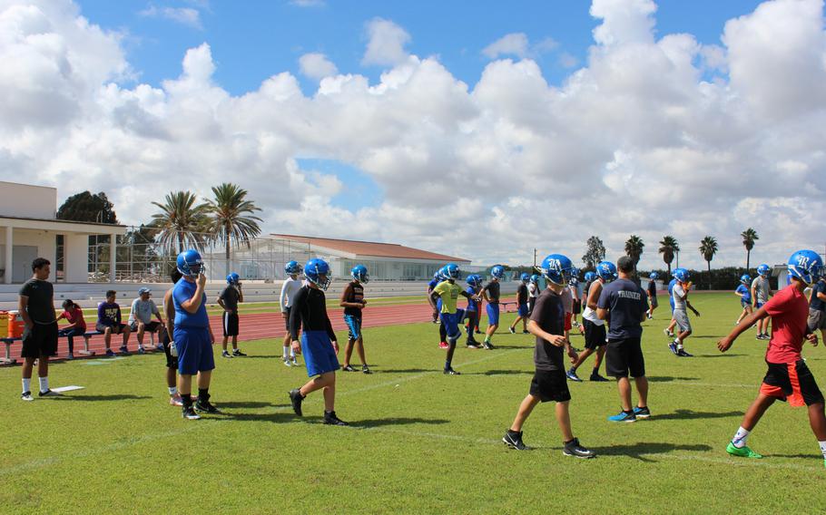 The DODEA-Europe Division II defending champion Rota Admirals conduct a drill at their preseason football camp in August. 
