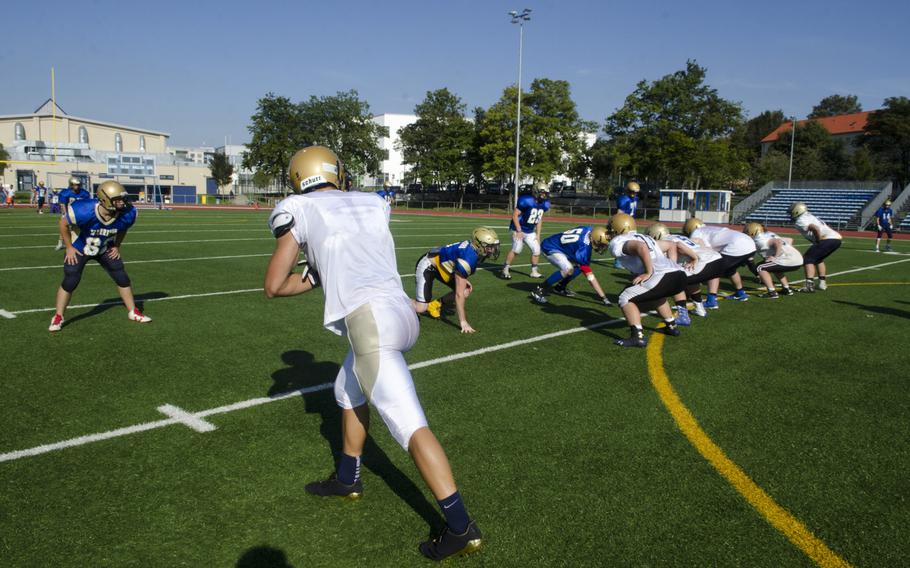 Members of the Wiesbaden football team take part in a full-team session at a preseason practice in Wiesbaden, Germany, Tuesday, Aug. 29, 2017.
