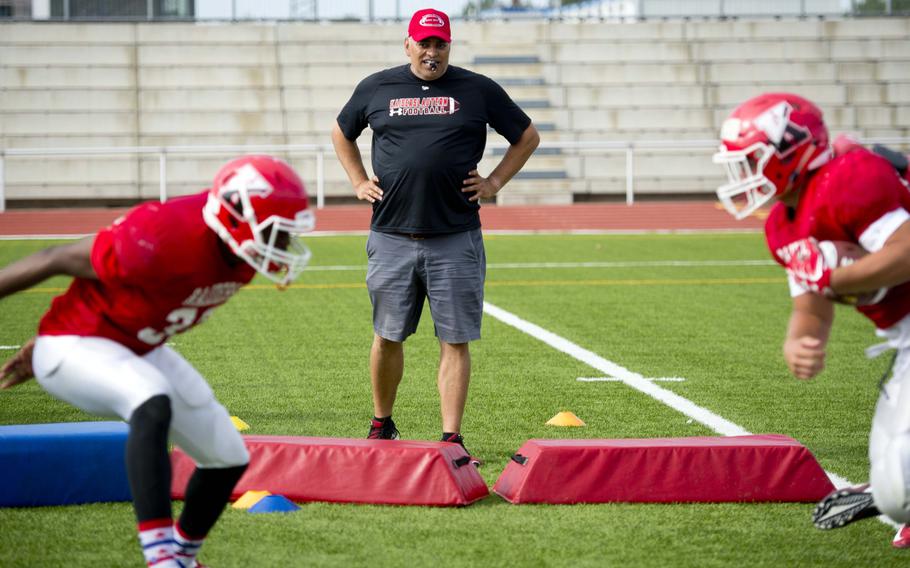 Lin Hairstone, Kaiserslautern head football coach, watches his players during practice at Vogelweh, Germany, on Thursday, Aug. 24, 2017.