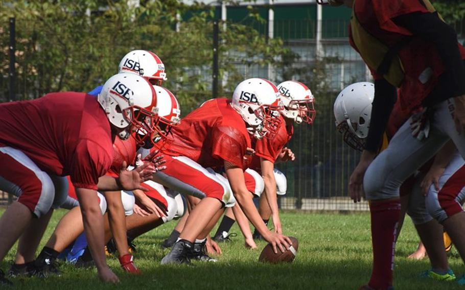 The International School of Brussels Raiders line up during a preseason scrimmage.
