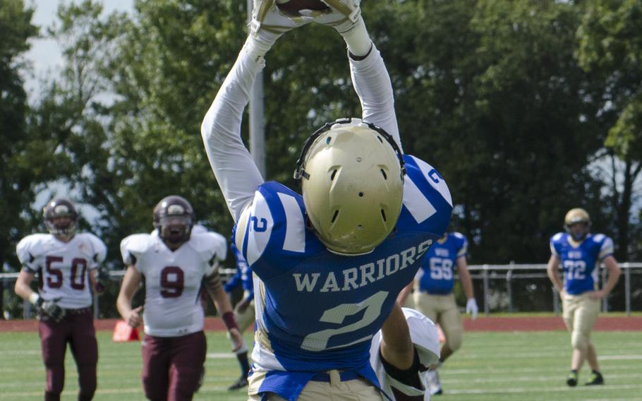 Wiesbaden junior receiver Donte Hurt makes an acrobatic touchdown catch in the the Warriors' matchup with Vilseck, on Saturday, Sept. 9, 2017 in Wiesbaden, Germany. 