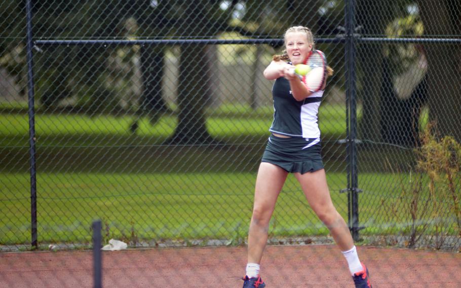 SHAPE’s Synnoeve Lillefosse hits a tennis ball with all of her strength in a back-and-forth match against Lakenheath’s Tiaralei Cade during a singles tennis game at RAF Lakenheath, England, Friday, September 15, 2017. Lillefosse won 8-3.