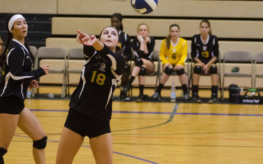 Stuttgart's Bella Brandt prepares to pass the volleyball in a match against Lakenheath in Wiesbaden, Germany, Saturday, Oct. 14, 2017. Stuttgart, last year's European champions, fell to Lakenheath but bounced back against Wiesbaden to split their two matchups.
