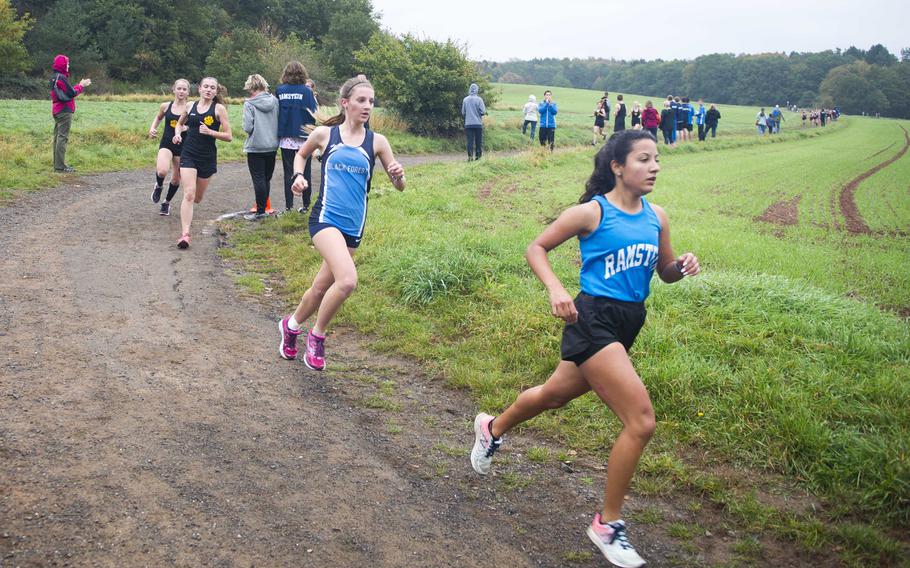 Ramstein's McKenzie Perkes pulls ahead of Black Forest Academy's Bianca Liberti and Stuttgart's Alycia Smith and McKinley Fielding during a cross country meet in Ramstein-Miesenbach, Germany, on Saturday, Oct. 21, 2017. 

