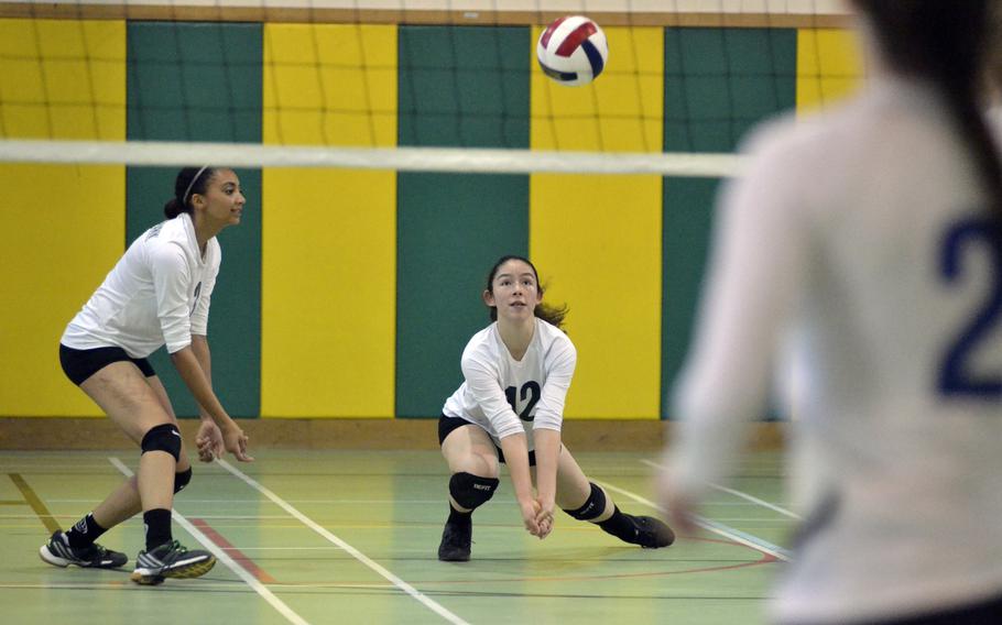 Alconbury’s Anna Downing goes for a dig against Brussels during a varsity volleyball game at RAF Alconbury, England, Saturday, Oct. 21, 2017. The Dragons defeated Brussels 26-24, 18-25, 11-25, 25-20, 15-11. 