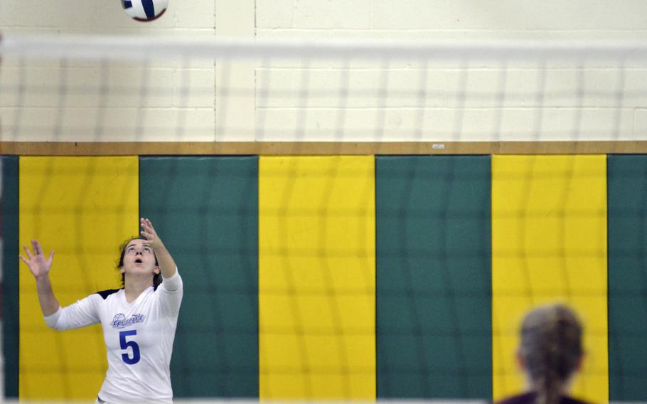 Brussels' Juliette Mobley serves against AFNORTH during a varsity volleyball game at RAF Alconbury, England, Saturday, Oct. 21, 2017. Mobley had 21 assists in the Brussels victory. 
