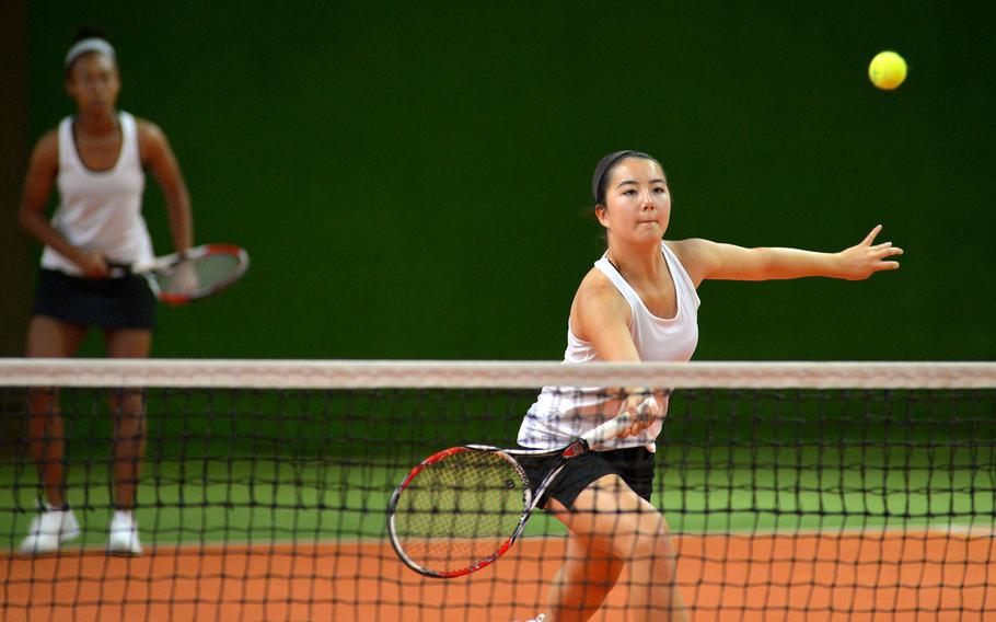 Stuttgart's Hannah Cahill keeps her eyes on the ball as she prepares to make a return at the DODEA-Europe tennis championships in Wiesbaden, Germany, Thursday, Oct. 26, 2017. Cahill and teammate Kandis Ajyman defeated Alara Kocabas and Annette Belleman of Brussels 6-2, 6-4.