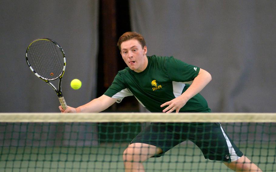 SHAPE's Gregor Vargyas makes a play at the net as he and teammate Seth Banken beat Ramstein's Grady Gallagher and Jordan Liebig 4-6, 7-5, 62 at the DODEA-Europe tennis finals in Wiesbaden, Germany, Friday, Oct. 27, 2017. 

