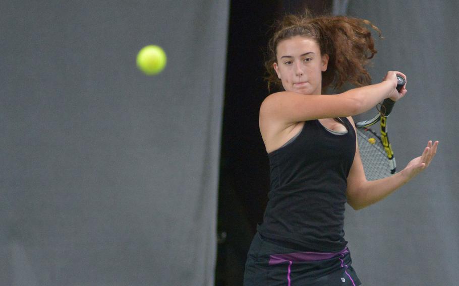 Bahrain's Chloe McHenry returns a shot against Vicenza's Catherine Gulihur in a semifinal match at the DODEA-Europe tennis finals in Wiesbaden, Germany, Friday, Oct. 27, 2017. McHenry lost 6-0, 6-0.

